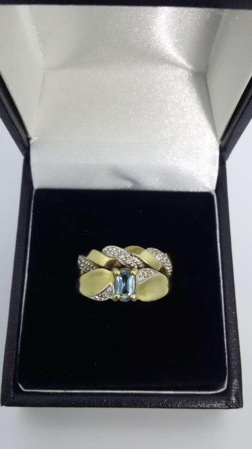 9ct Gold Light blue Topaz double band